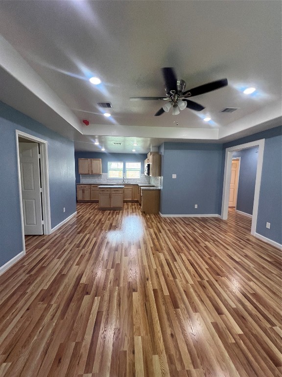 7613 Lady Street Houston, TX 77021 - Photo 5 of 18 a view of a room with wooden floor