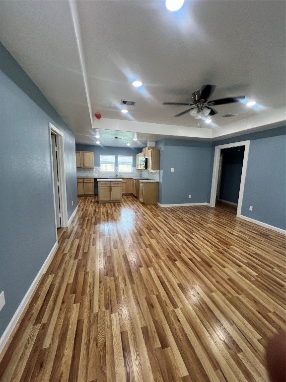 7613 Lady Street Houston, TX 77021 - Photo 6 of 18 a view of a room with wooden floor