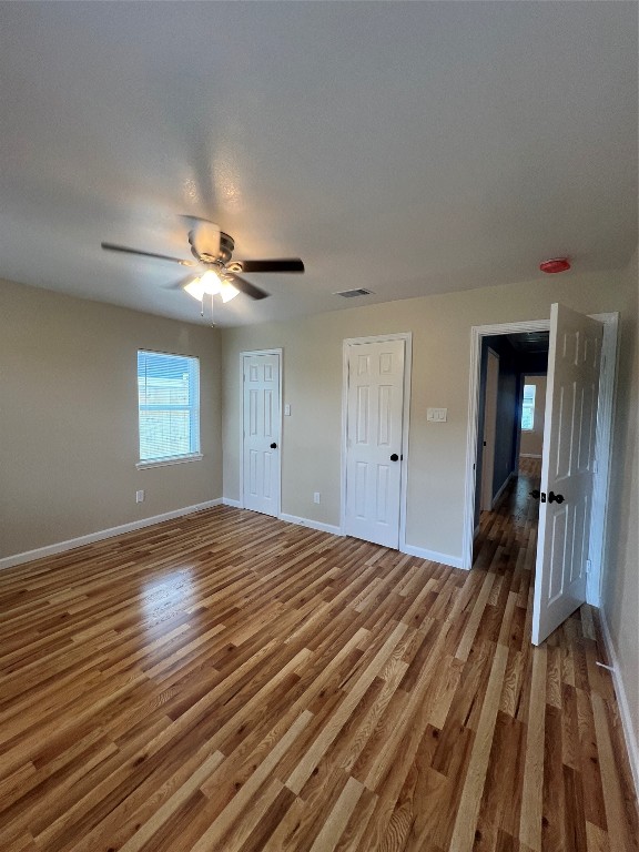 7613 Lady Street Houston, TX 77021 - Photo 8 of 18 a view of empty room with wooden floor
