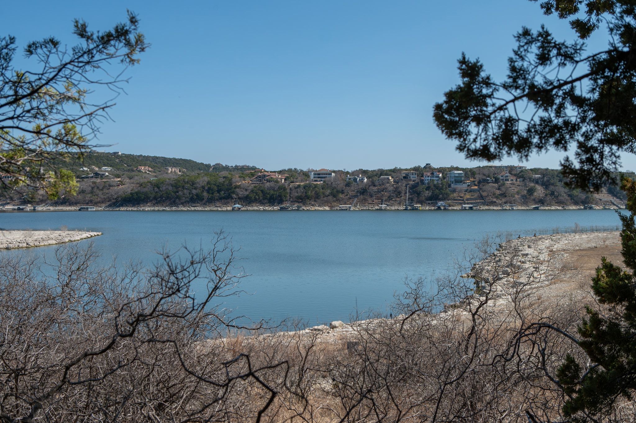 17831 West Reed Park Road Lago Vista, TX 78645 - Photo 11 of 33 a view of a lake from a yard