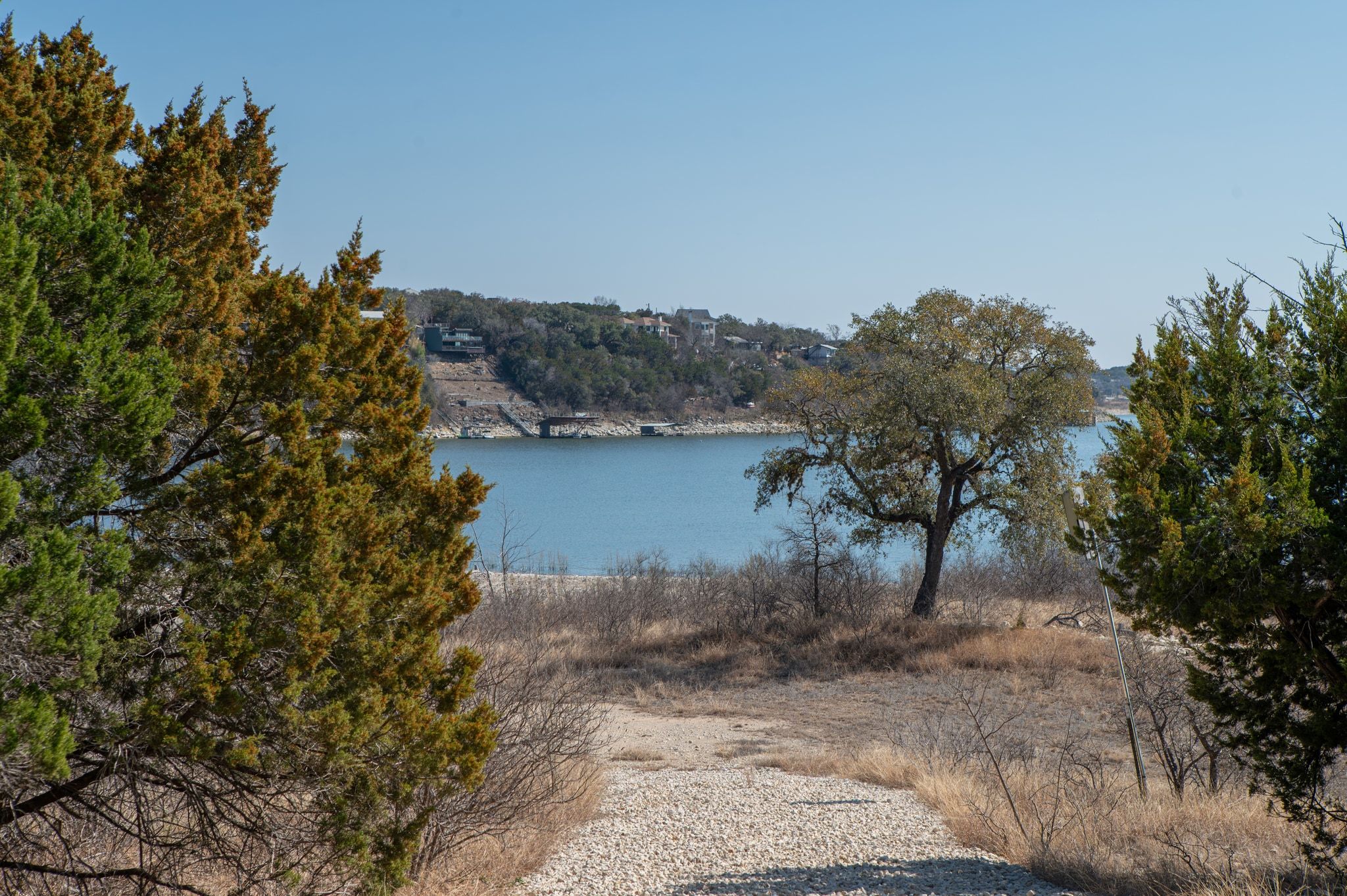 17831 West Reed Park Road Lago Vista, TX 78645 - Photo 14 of 33 a view of a lake with a mountain in the background