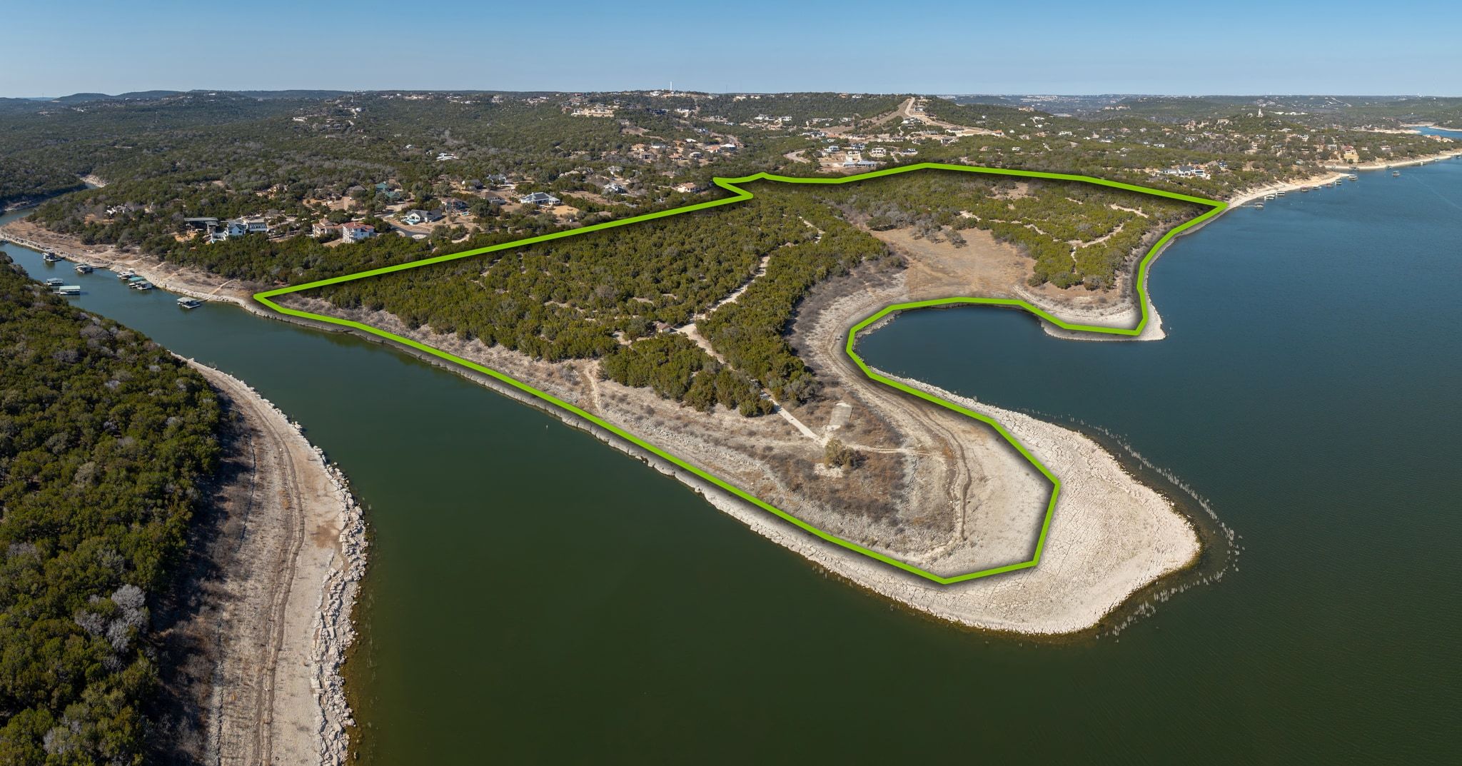 17831 West Reed Park Road Lago Vista, TX 78645 - Photo 2 of 33 an aerial view of a house with a lake view