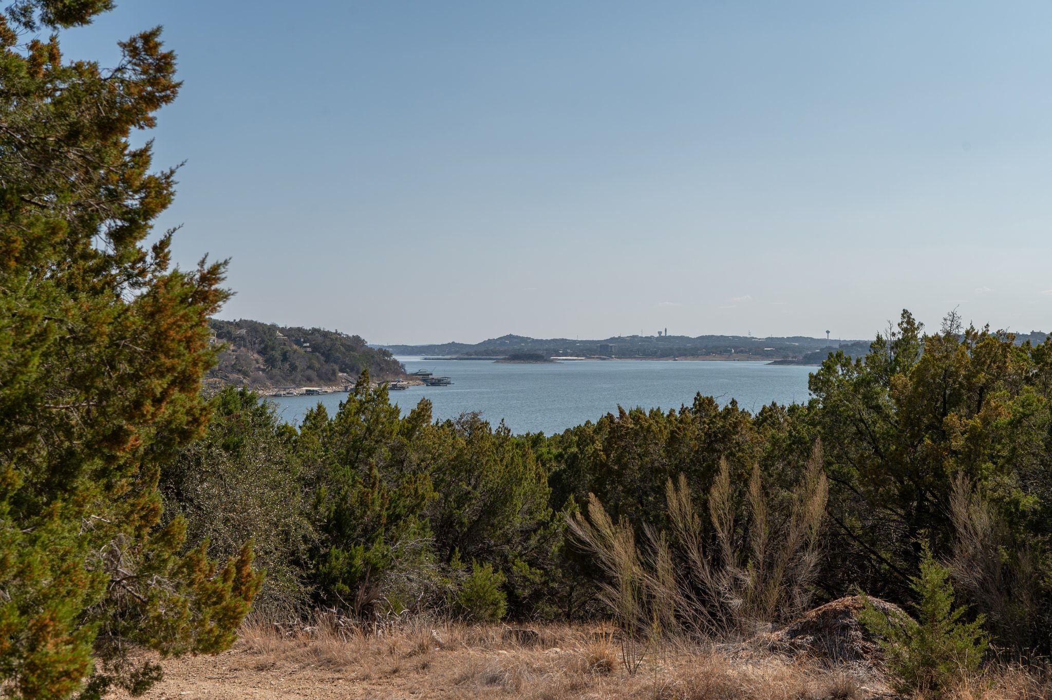 17831 West Reed Park Road Lago Vista, TX 78645 - Photo 25 of 33 a view of a lake with a mountain in the background
