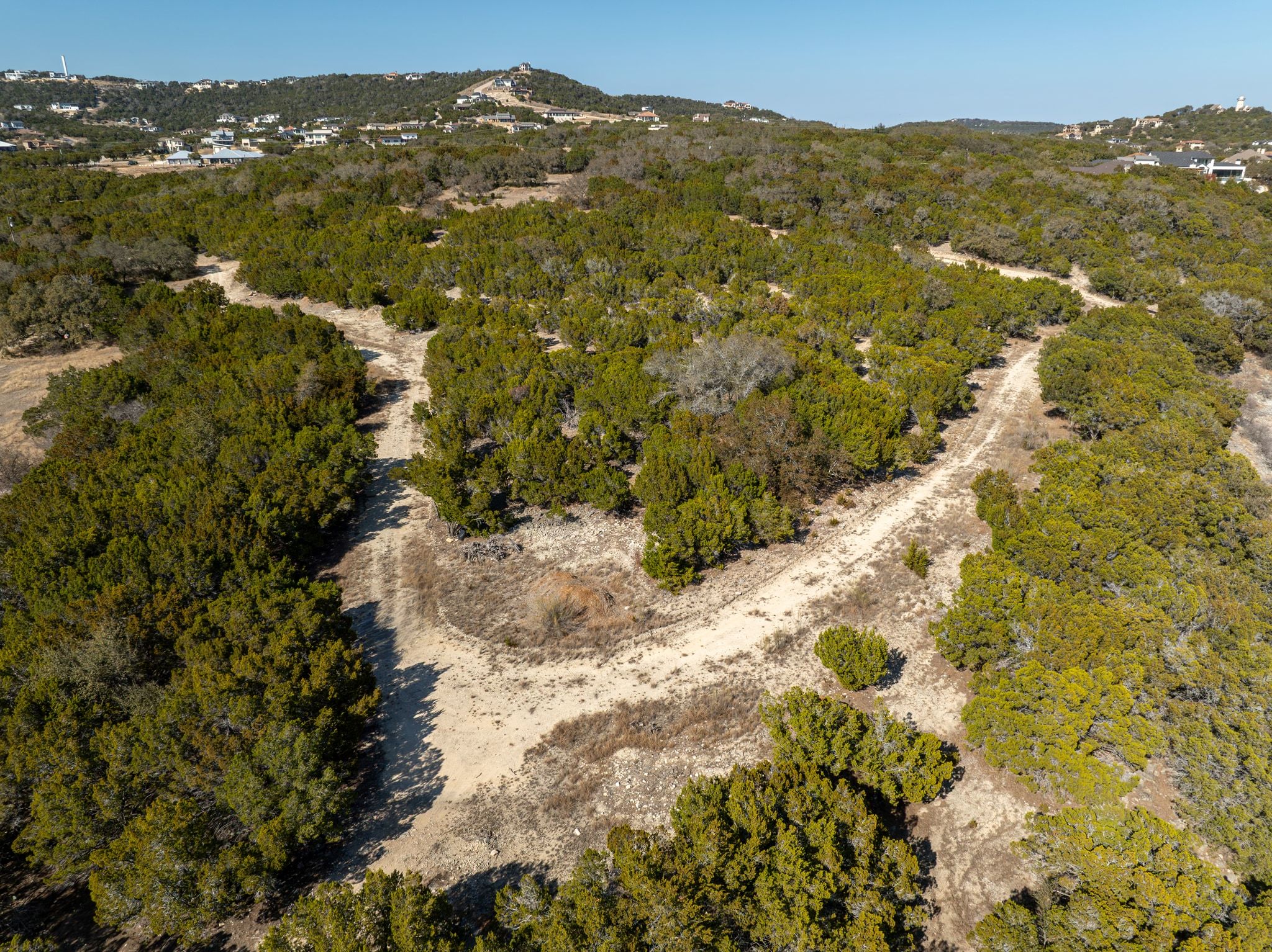 17831 West Reed Park Road Lago Vista, TX 78645 - Photo 32 of 33 a view of a houses with a field