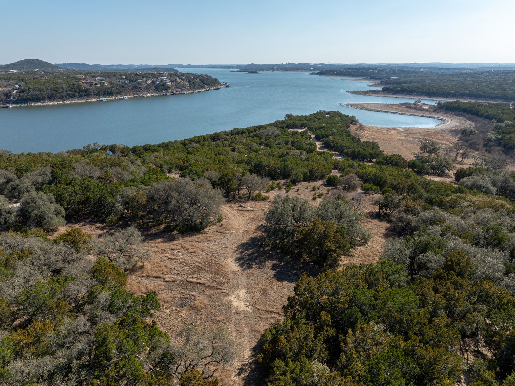 17831 West Reed Park Road Lago Vista, TX 78645 - Photo 33 of 33 an aerial view of beach and residential houses with outdoor space