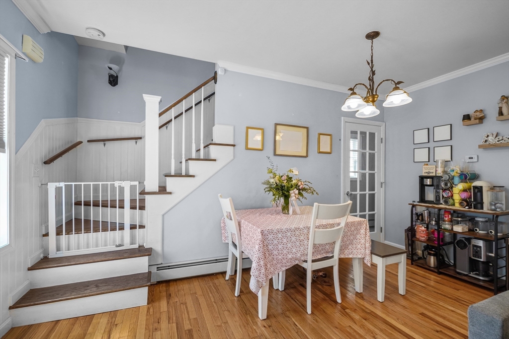 249 Baird Street Fall River, MA 02721 - Photo 7 of 23 a view of a dining room with furniture and wooden floor