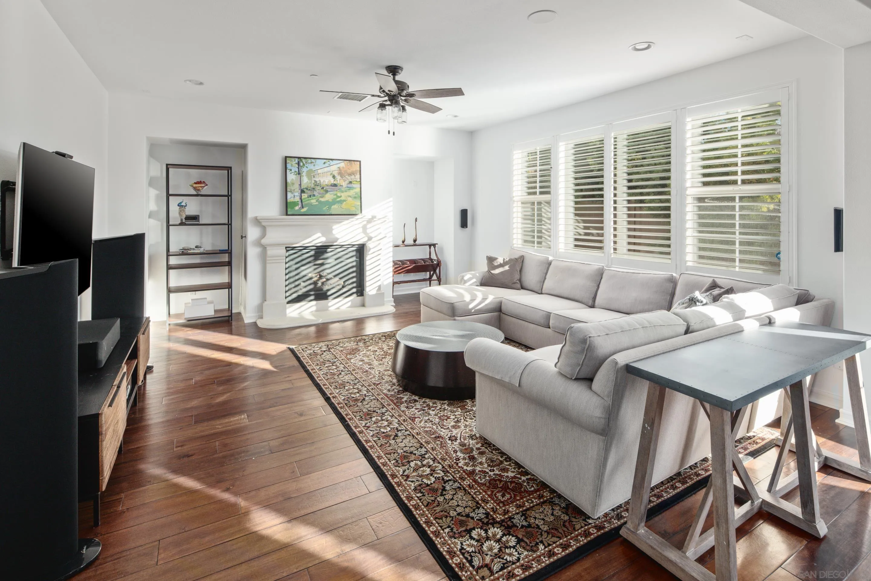 931 Bluejack Road Encinitas, CA 92024 - Photo 11 of 37 a living room with furniture and a flat screen tv