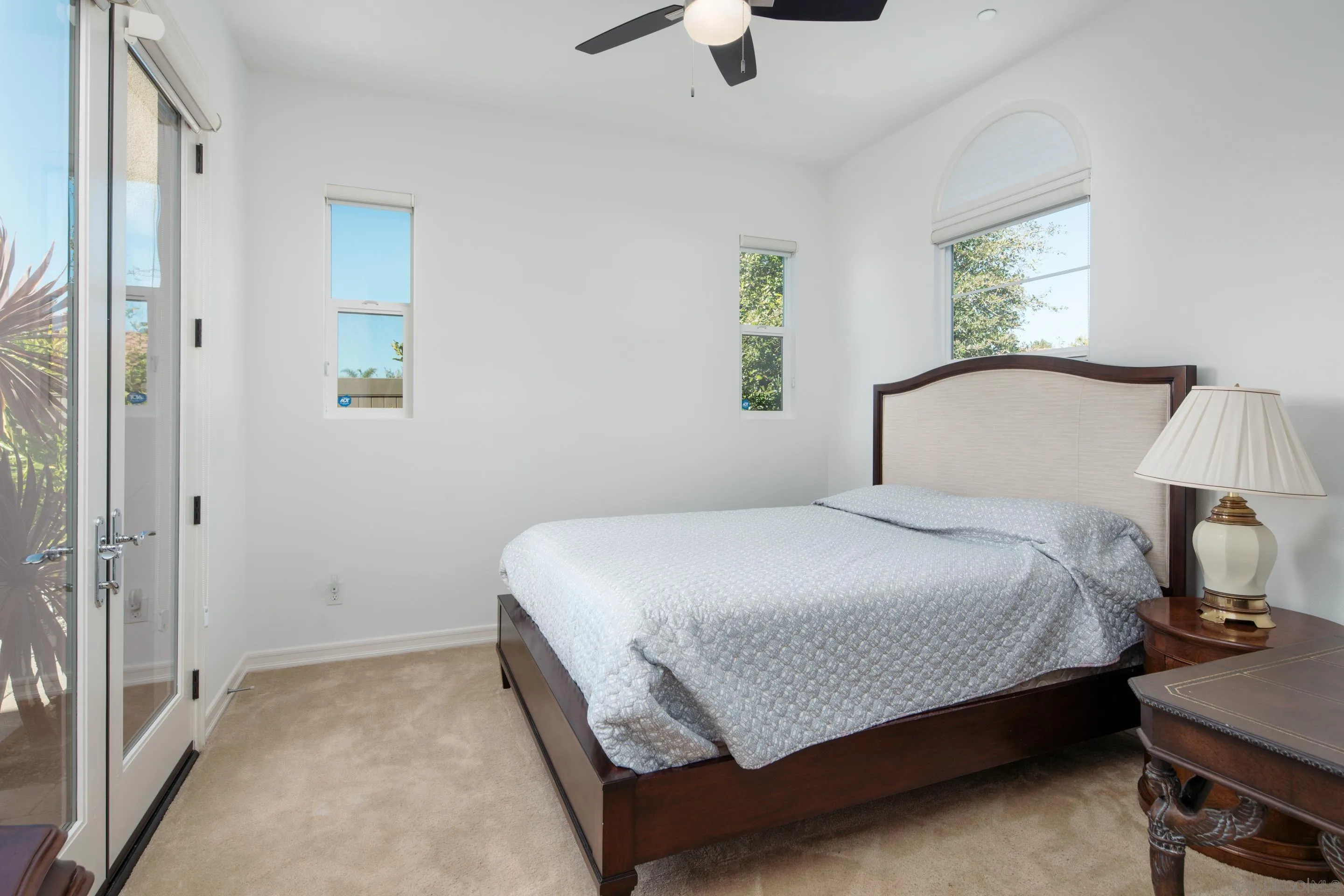931 Bluejack Road Encinitas, CA 92024 - Photo 16 of 37 a bedroom with a bed and a window