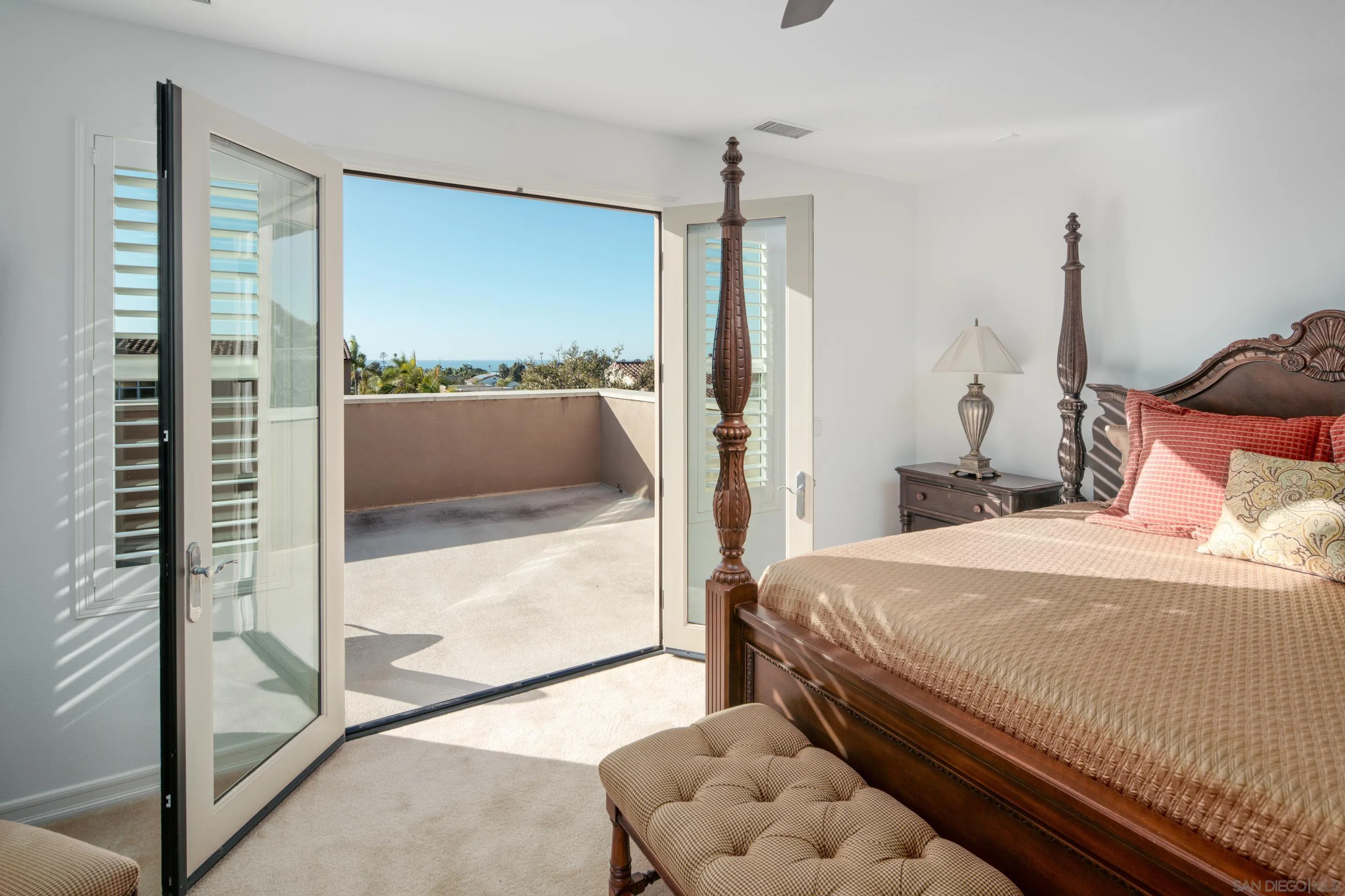 931 Bluejack Road Encinitas, CA 92024 - Photo 20 of 37 a bedroom with a bed and a window