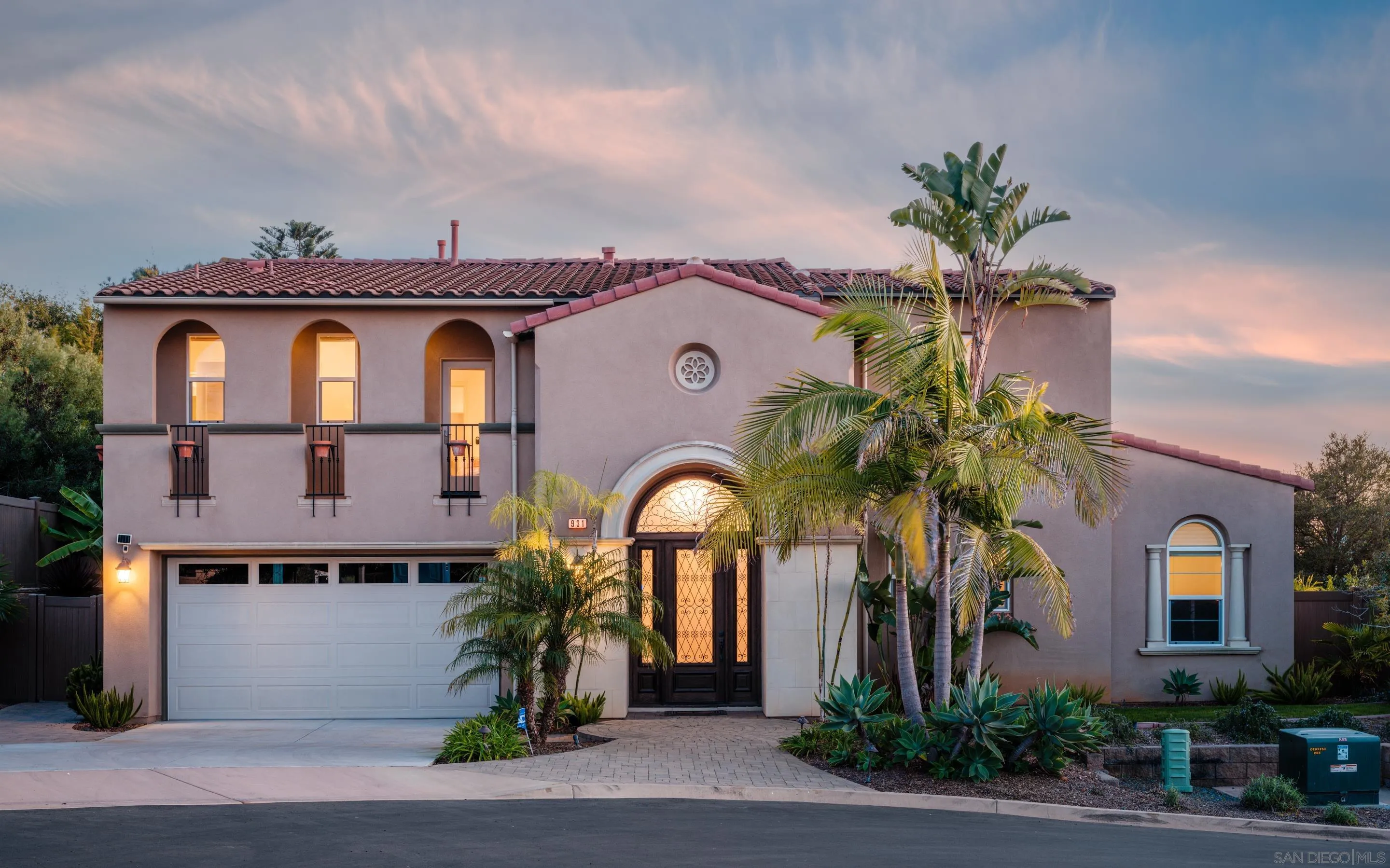 931 Bluejack Road Encinitas, CA 92024 - Photo 2 of 37 a front view of a house with a garden