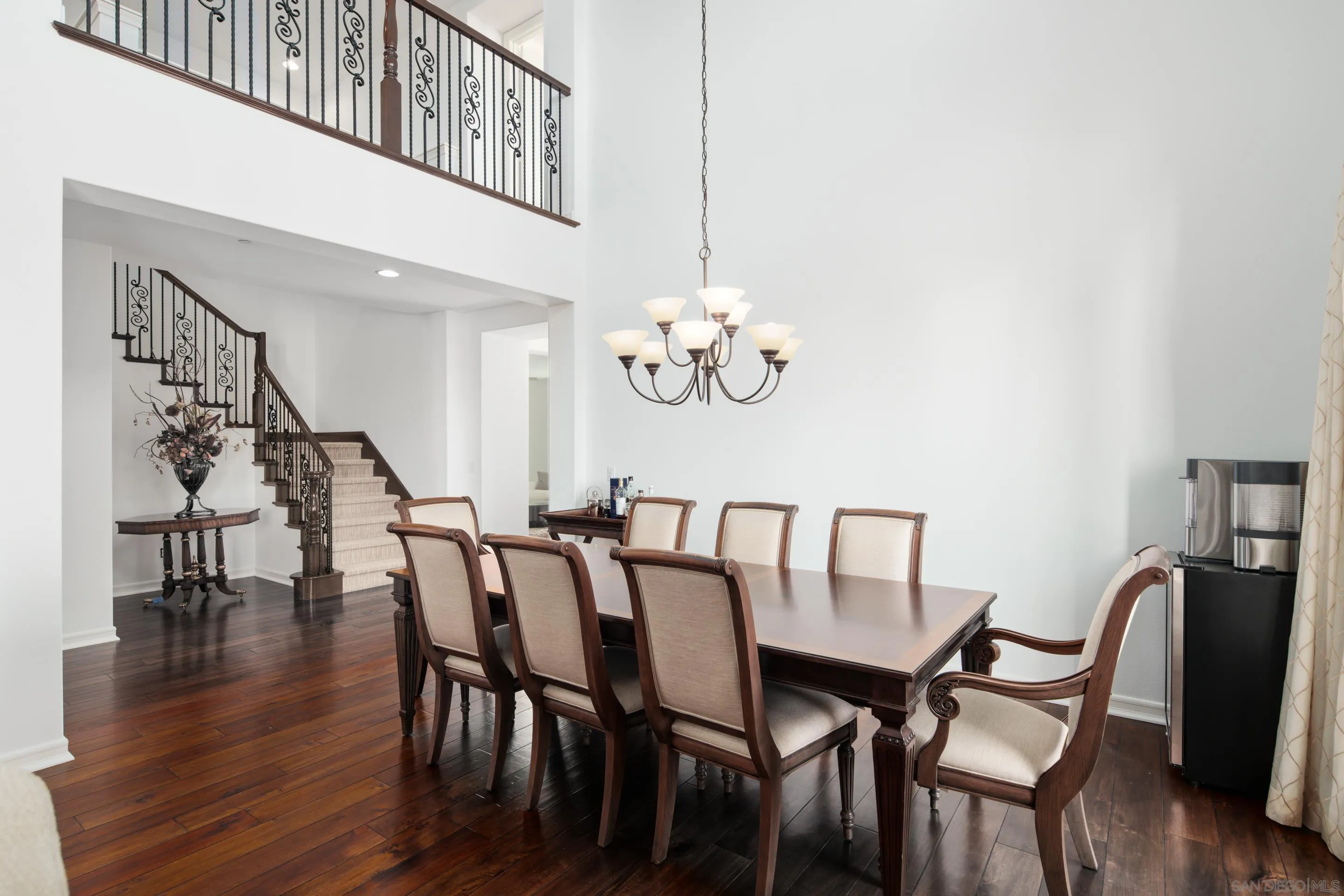 931 Bluejack Road Encinitas, CA 92024 - Photo 7 of 37 a view of a dining room with furniture and wooden floor