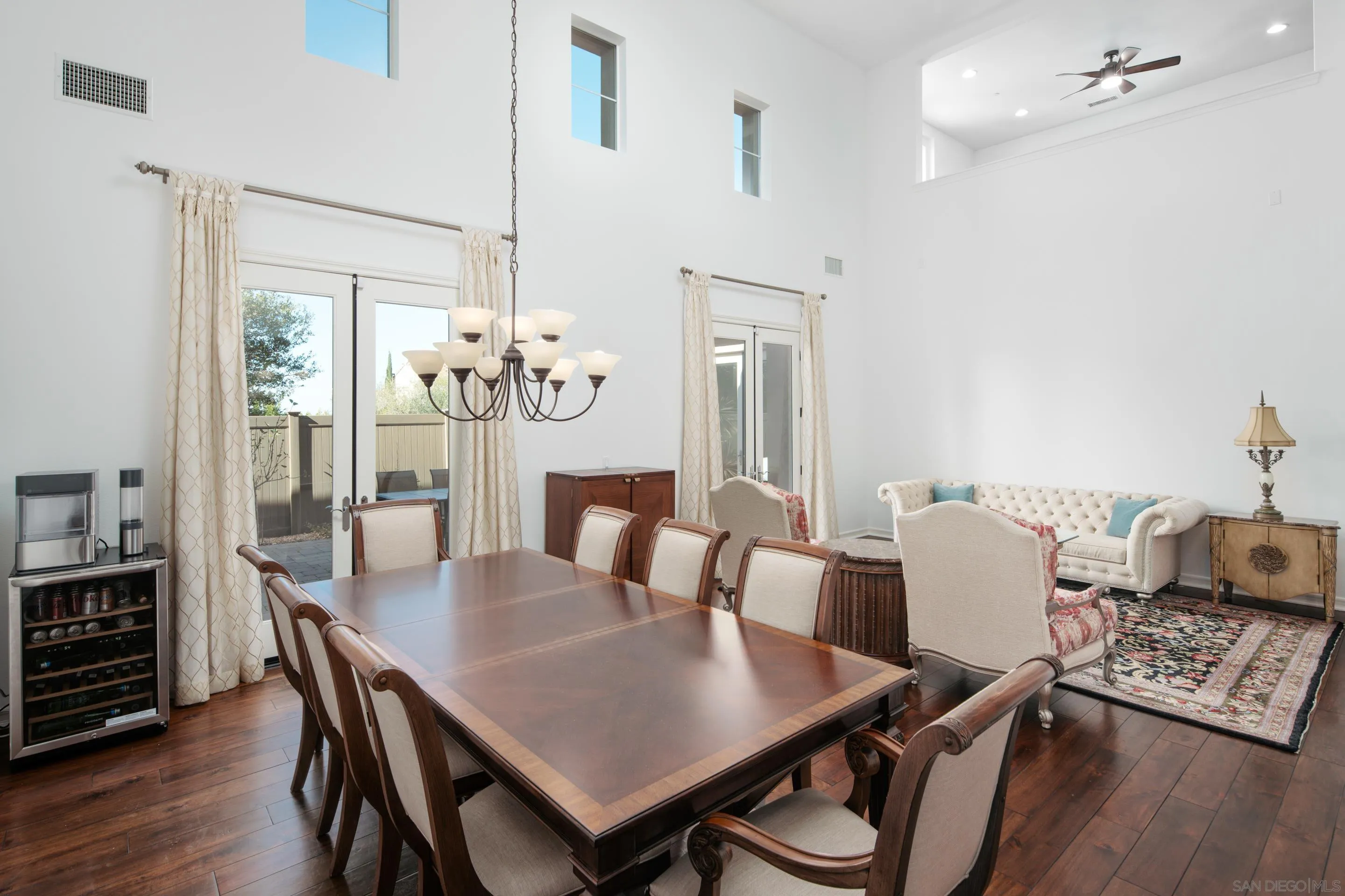 931 Bluejack Road Encinitas, CA 92024 - Photo 9 of 37 a view of a dining room with furniture and wooden floor
