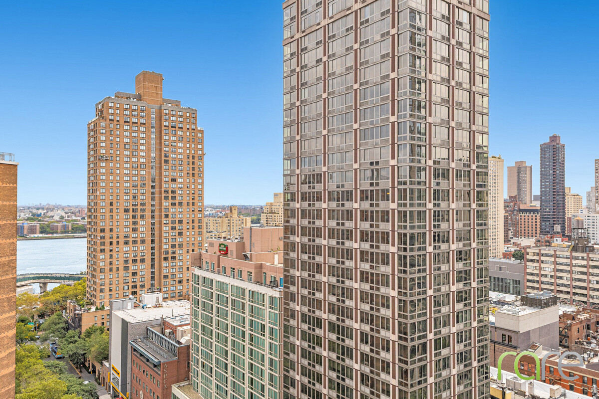 340 East 93rd Street, Unit 23G Manhattan, NY 10128 - Photo 5 of 16 a view of a city with tall buildings