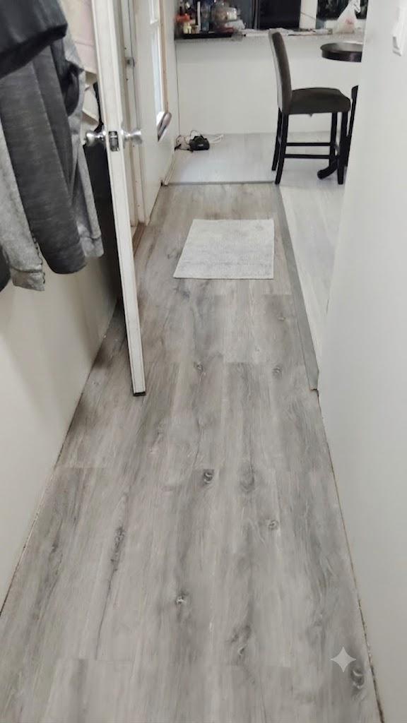 13025 Thunder Road King George, VA 22485 - Photo 27 of 34 Modern hallway with sleek flooring.