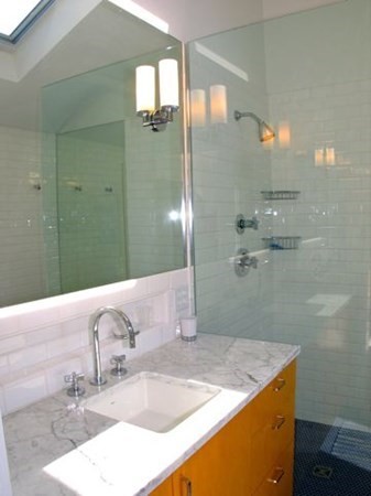 2 Nonamesset Road Edgartown, MA 02539 - Photo 24 of 36 a bathroom with a granite countertop sink and a mirror