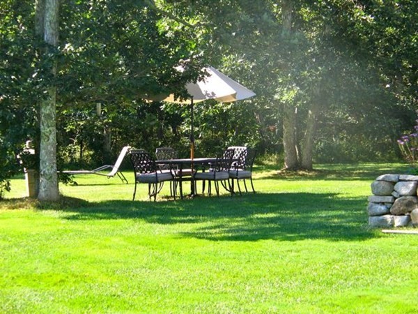 2 Nonamesset Road Edgartown, MA 02539 - Photo 35 of 36 a front view of a garden with a slide