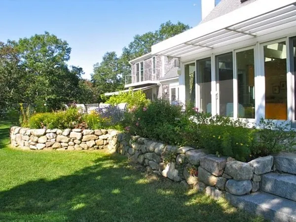a view of a house with a garden
