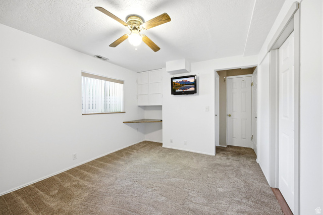 734 Sandy Dunes Drive Sandy, UT 84094 - Photo 24 of 36 Flex/Rec Room could be used as a basement apartment or turned back into a 5th Bedroom.