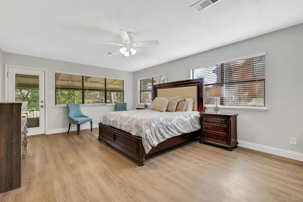 a bed room with a bed and furniture