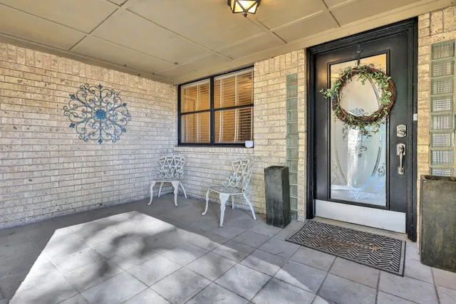 a view of a entryway door of a house