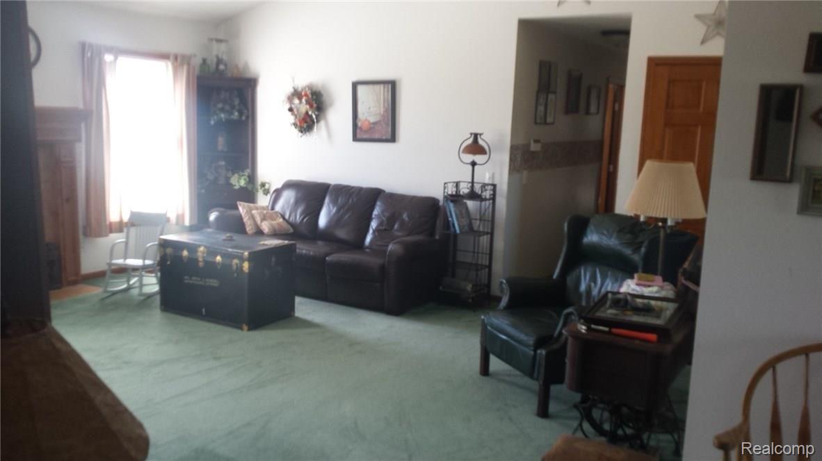 14289 Gilbert Road Allenton, MI 48002 - Photo 4 of 19 This is a view of the living room.