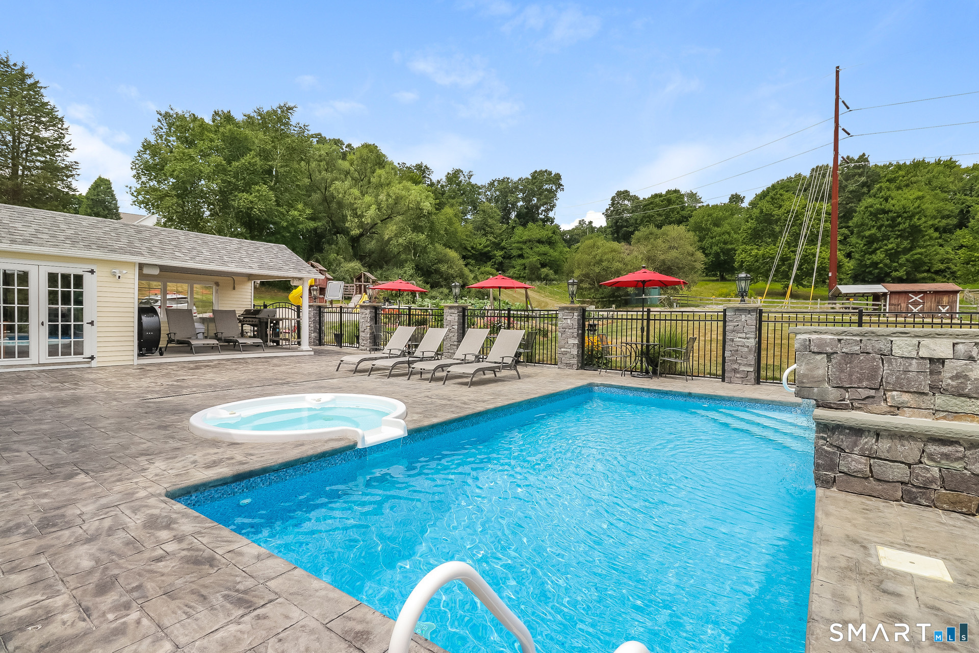 341 High Street Extension Thomaston, CT 06787 - Photo 4 of 39 a view of a swimming pool with a patio and a yard