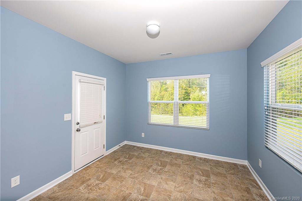9915 Paper Tree Road Charlotte, NC 28227 - Photo 12 of 35 an empty room with windows