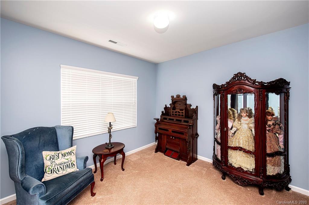 9915 Paper Tree Road Charlotte, NC 28227 - Photo 3 of 35 a living room with furniture