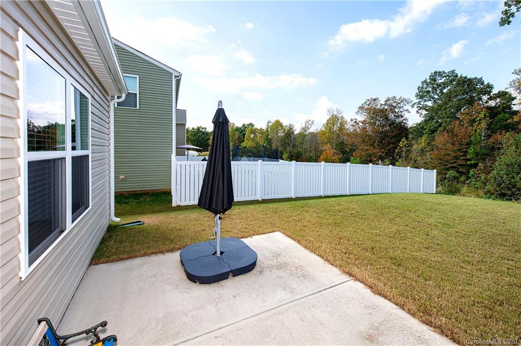 9915 Paper Tree Road Charlotte, NC 28227 - Photo 27 of 35 a backyard of a house
