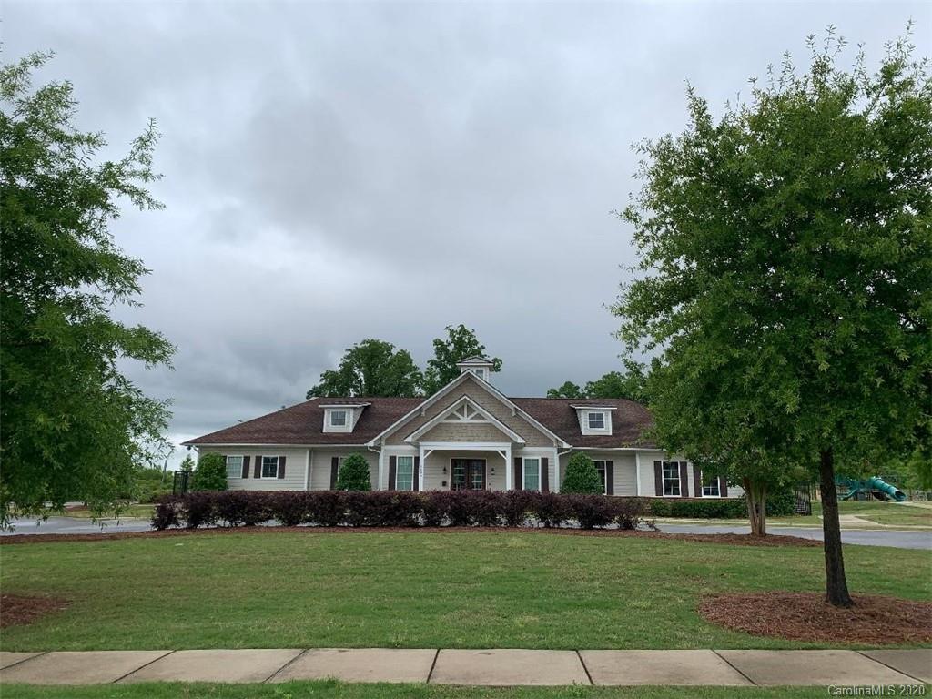 9915 Paper Tree Road Charlotte, NC 28227 - Photo 32 of 35 a front view of a house with a garden