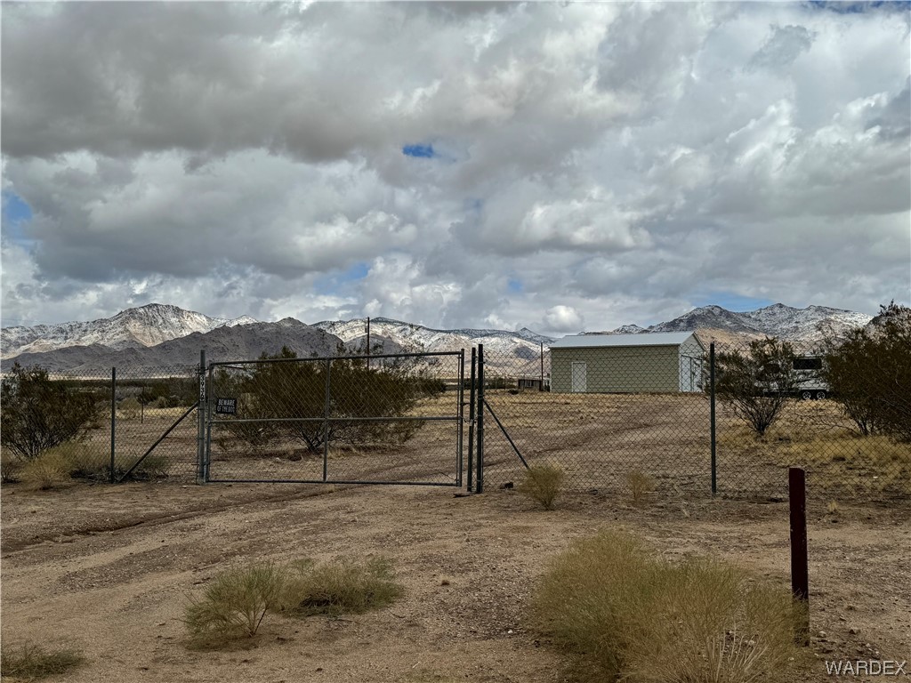 3936 Aztec Road Golden Valley, AZ 86413 - Photo 2 of 26 a view of a backyard