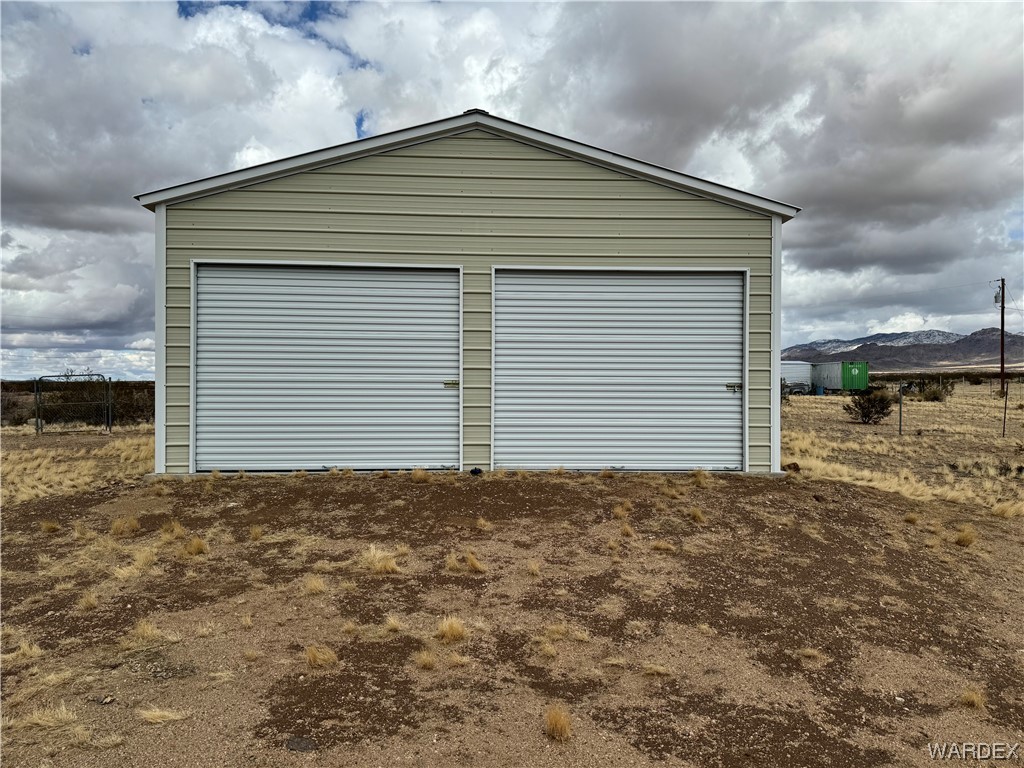 3936 Aztec Road Golden Valley, AZ 86413 - Photo 3 of 26 a front view of a house