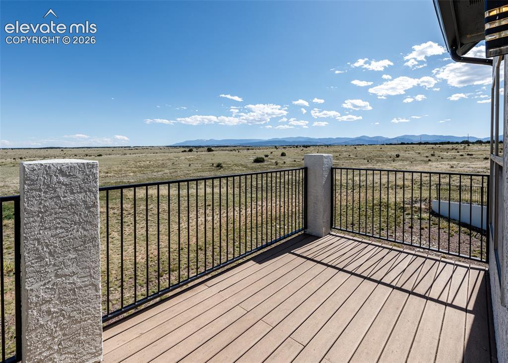 1120 Newton Road Pueblo, CO 81005 - Photo 14 of 46 a view of balcony with wooden floor
