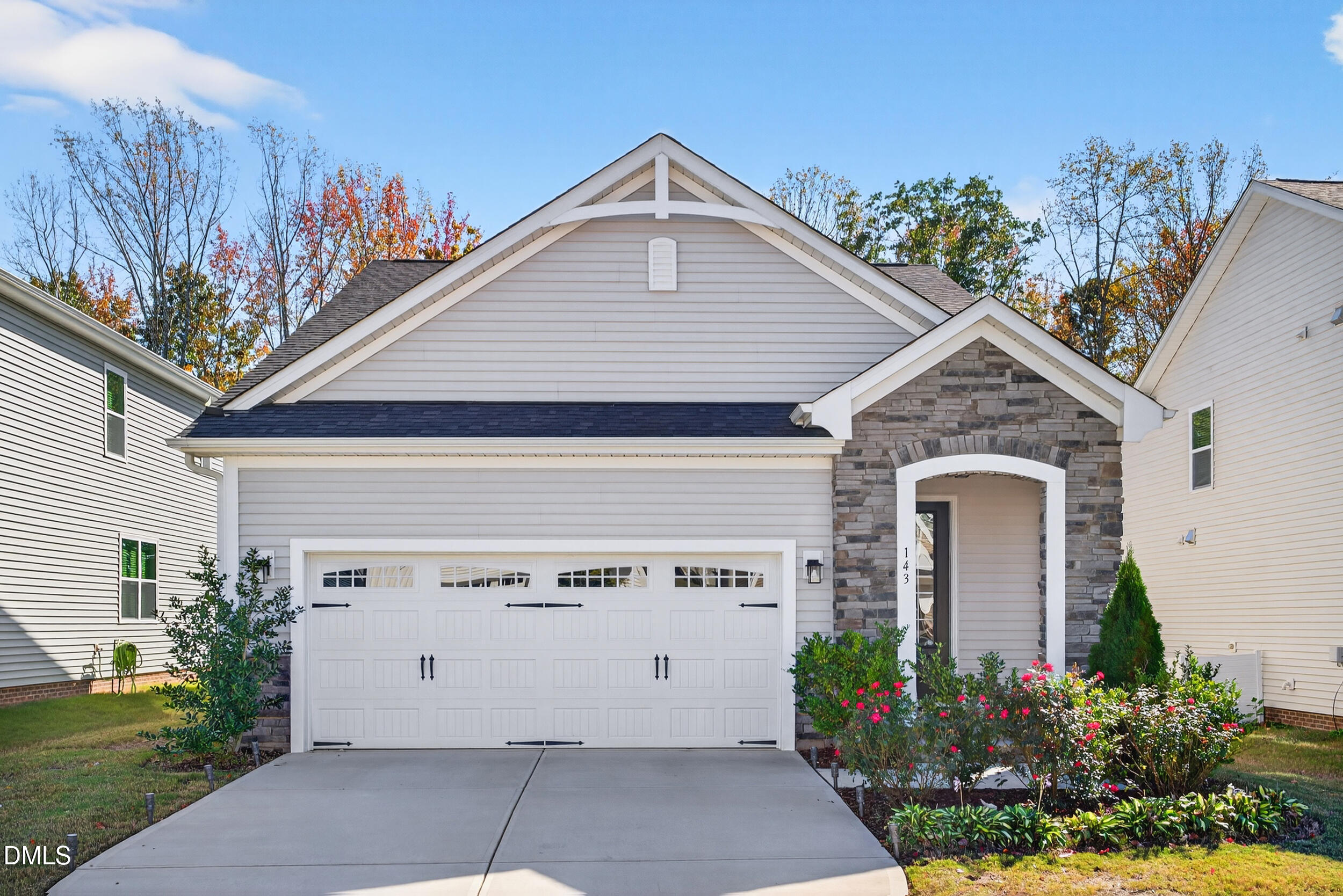 143 Umbrella Way Garner, NC 27529 - Photo 2 of 31 a view of a house with a garage