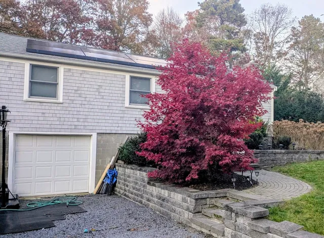 a living room with furniture fireplace and flat screen tv