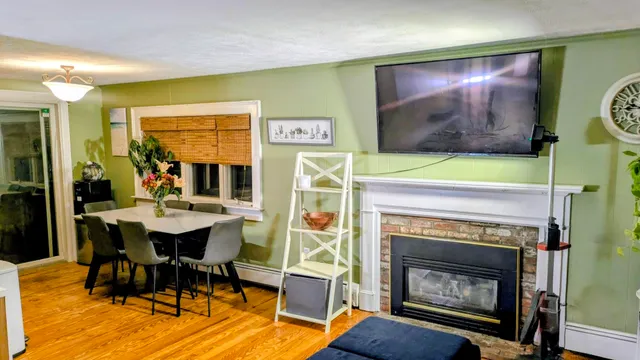 a bedroom with a bed and a television