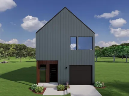 a backyard of a house with table and chairs plants and large tree