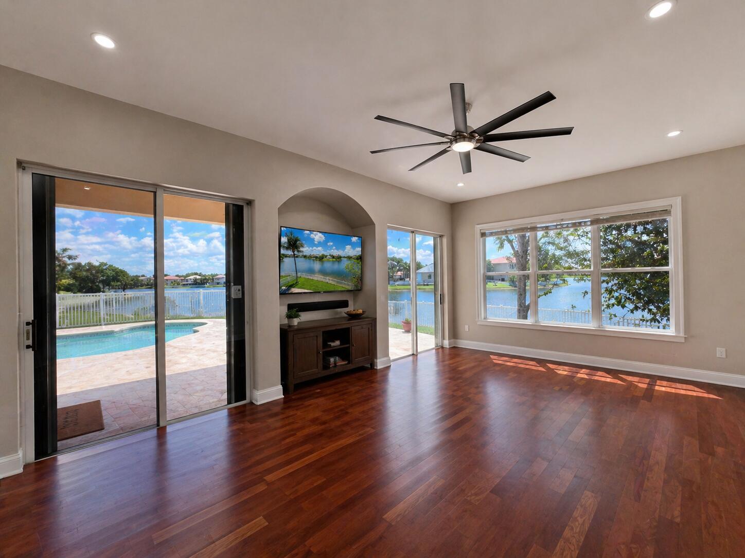 13196 Southwest 29th Street Miramar, FL 33027 - Photo 42 of 71 a view of empty room with wooden floor and fan