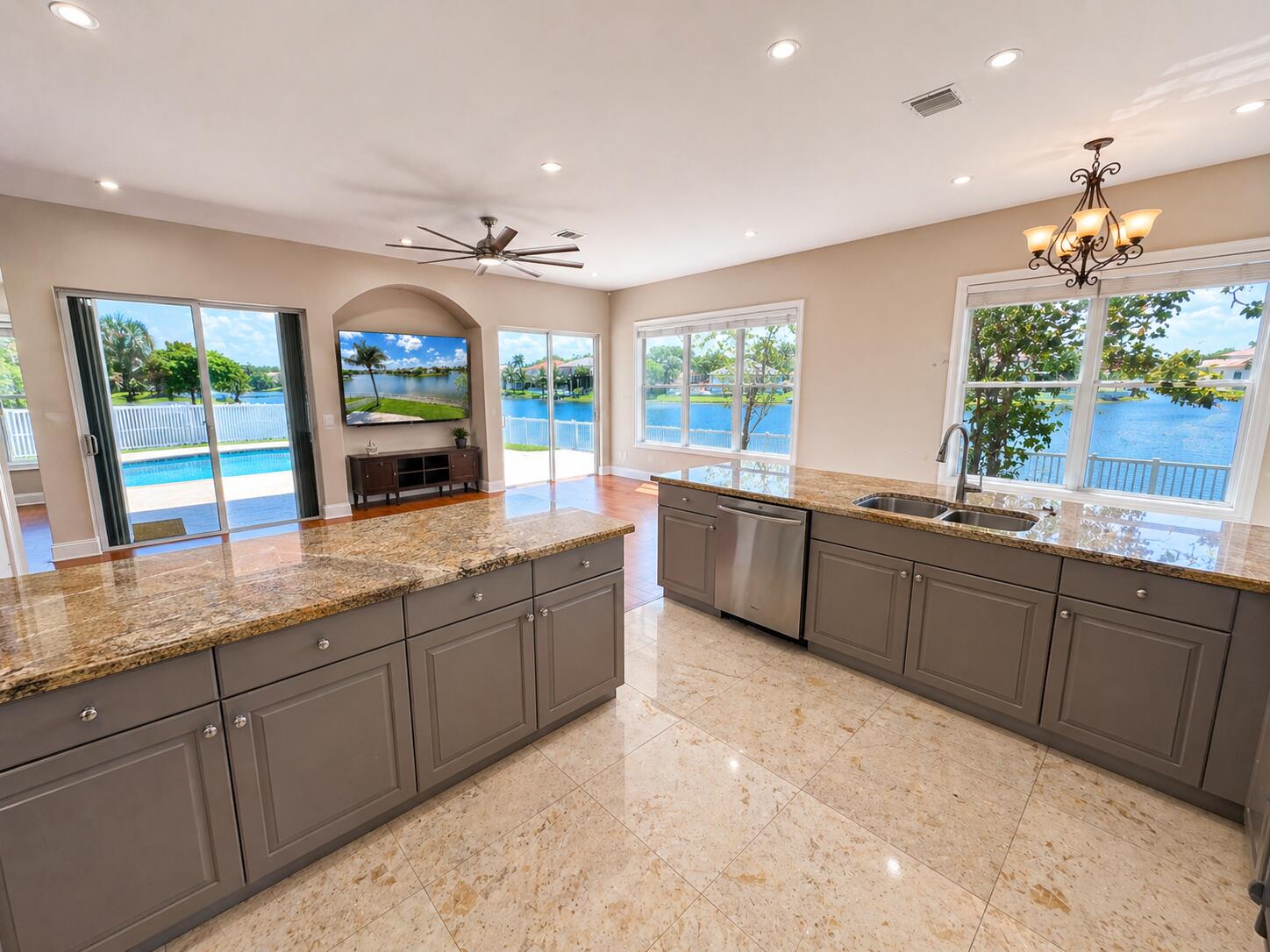 13196 Southwest 29th Street Miramar, FL 33027 - Photo 45 of 71 a kitchen with lots of counter top space and a sink