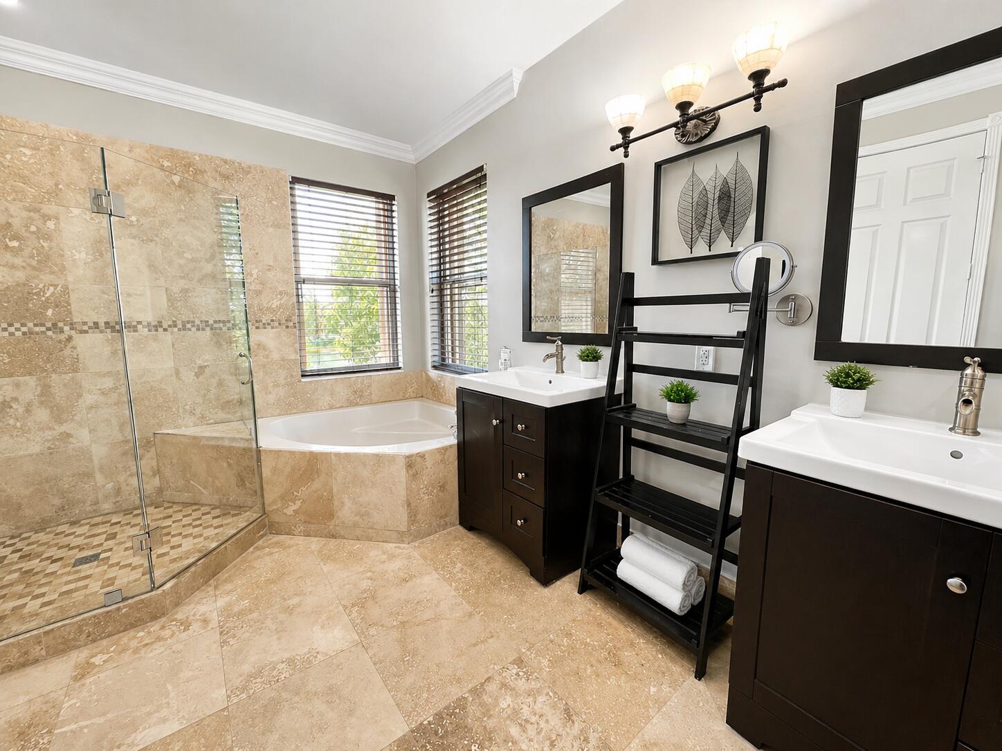 13196 Southwest 29th Street Miramar, FL 33027 - Photo 57 of 71 a spacious bathroom with a double vanity sink a mirror and a bathtub