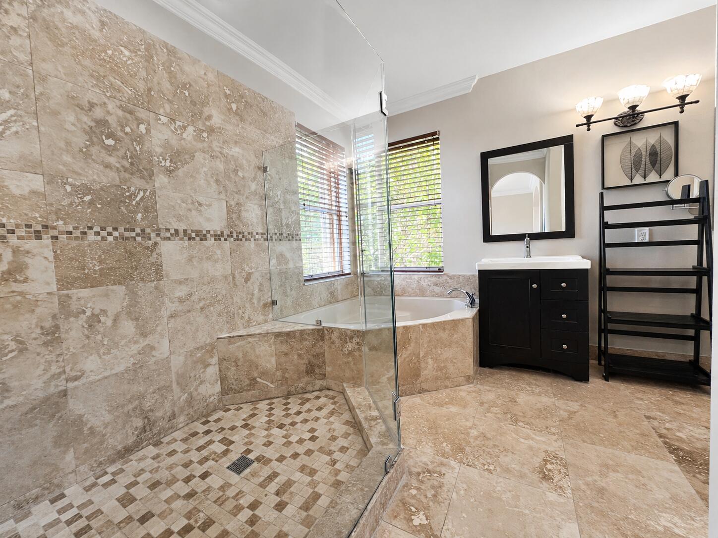 13196 Southwest 29th Street Miramar, FL 33027 - Photo 59 of 71 a bathroom with a bathtub sink and mirror