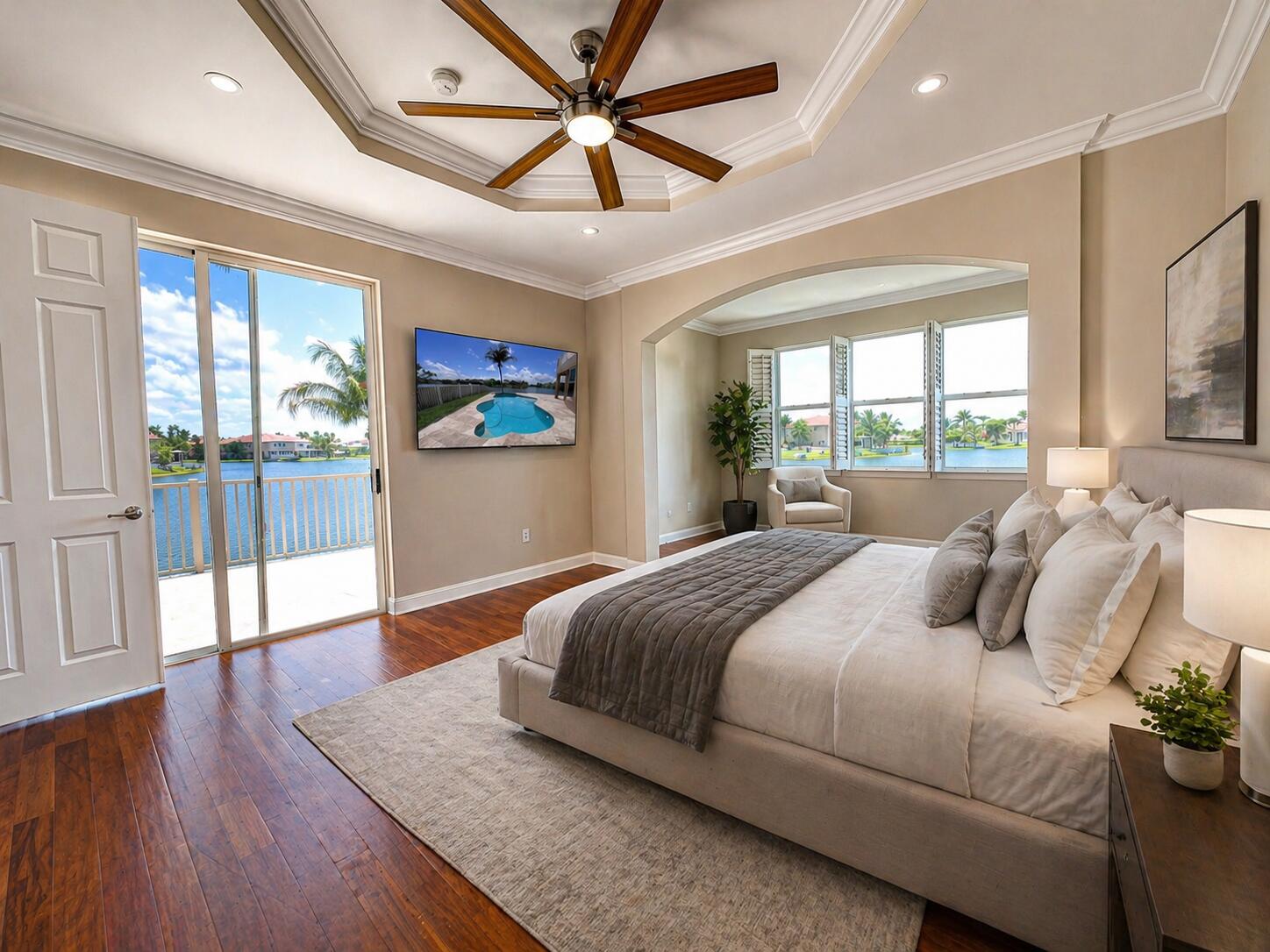 13196 Southwest 29th Street Miramar, FL 33027 - Photo 62 of 71 a bedroom with a large bed and a chandelier