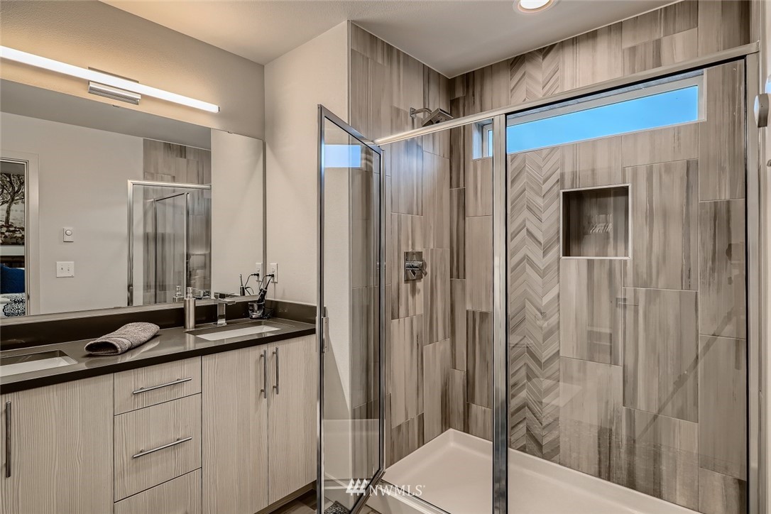 17905 35th Avenue Southeast, Unit A3 Bothell, WA 98012 - Photo 17 of 35 a bathroom with a sink and a mirror