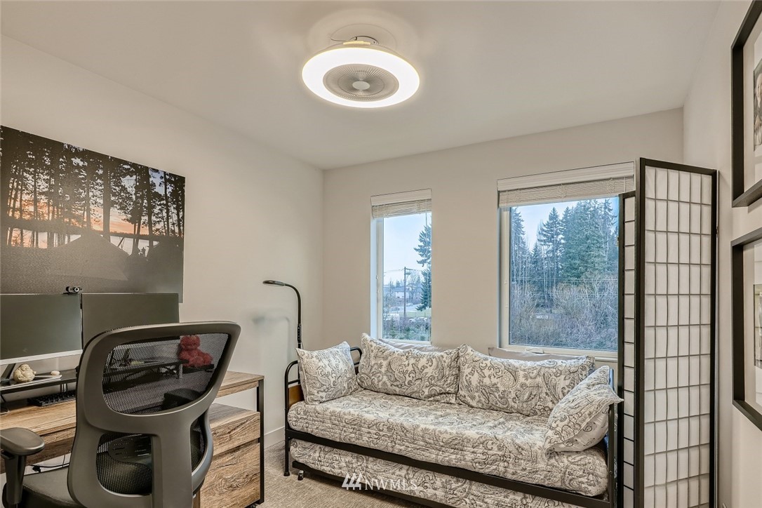17905 35th Avenue Southeast, Unit A3 Bothell, WA 98012 - Photo 20 of 35 a living room with furniture and a window