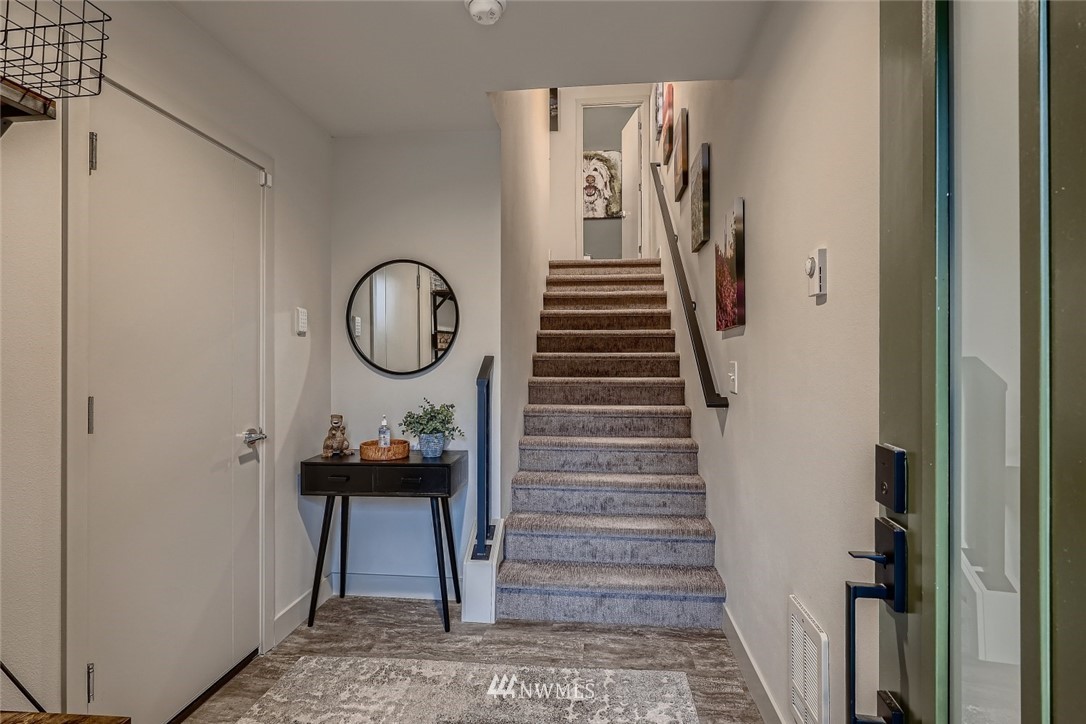17905 35th Avenue Southeast, Unit A3 Bothell, WA 98012 - Photo 2 of 35 a view of a hallway with seating area