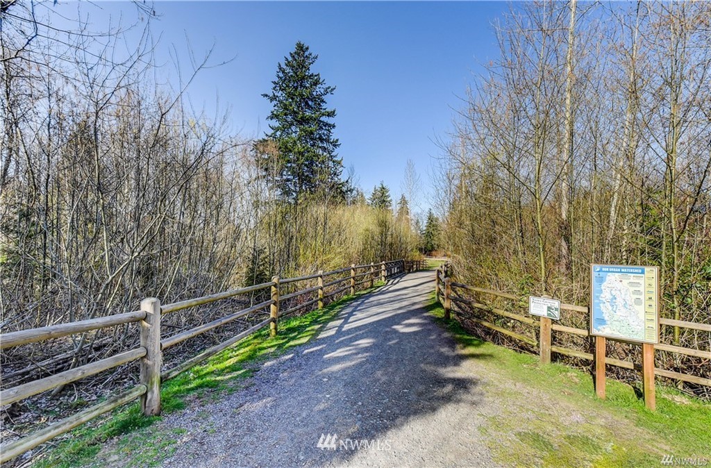 17905 35th Avenue Southeast, Unit A3 Bothell, WA 98012 - Photo 33 of 35 a view of a bench in a backyard