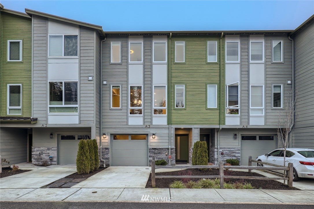 17905 35th Avenue Southeast, Unit A3 Bothell, WA 98012 - Photo 34 of 35 a front view of a building with lots of windows