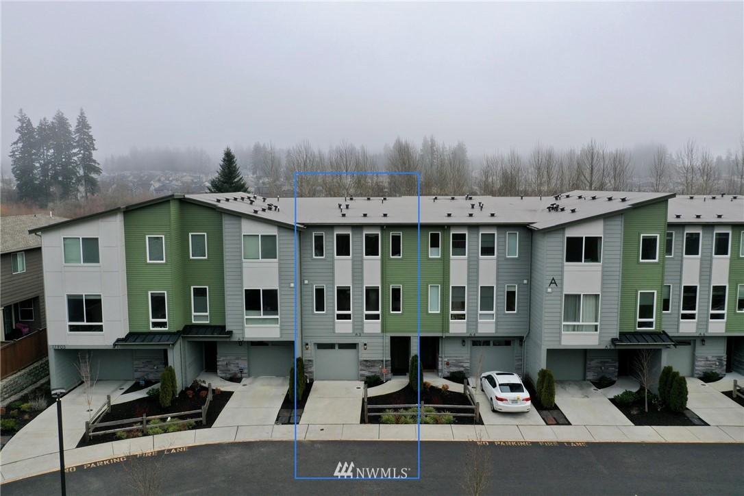 17905 35th Avenue Southeast, Unit A3 Bothell, WA 98012 - Photo 35 of 35 a front view of a house with sitting area