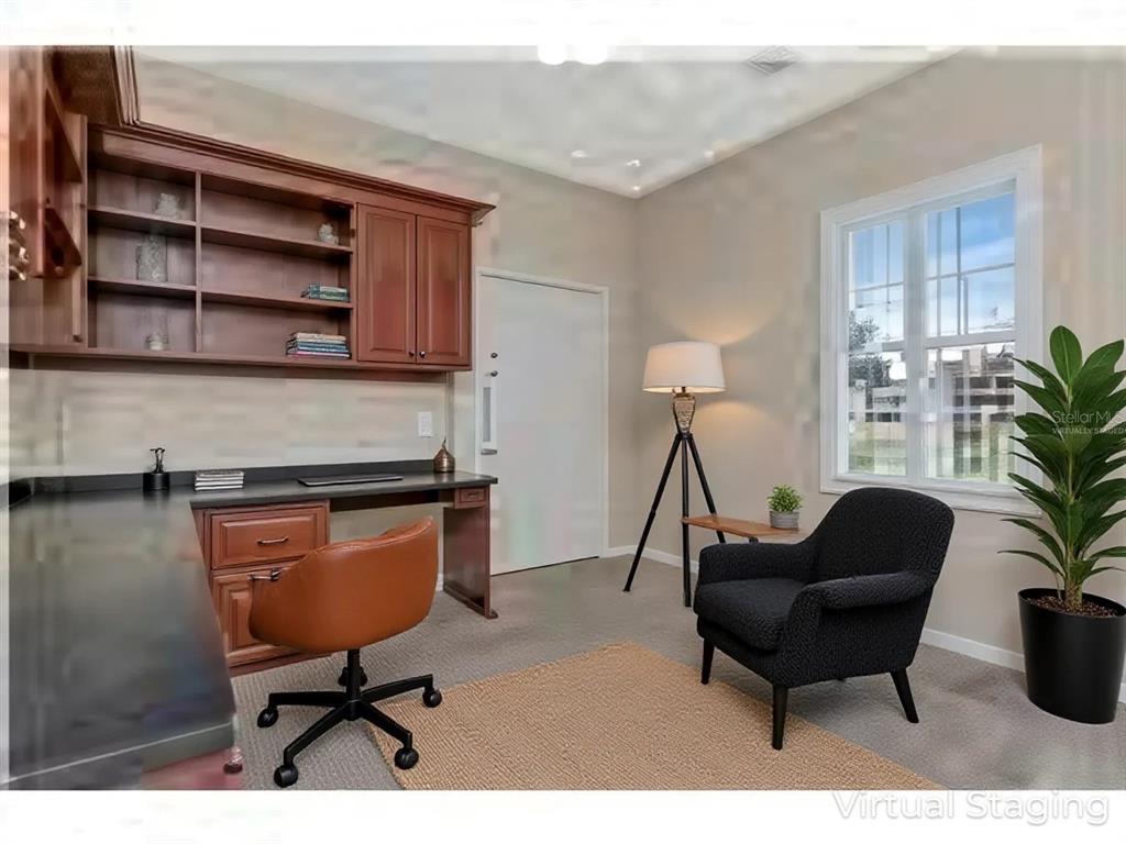 1835 Regal Mist Loop Trinity, FL 34655 - Photo 37 of 55 a living room with furniture and a potted plant