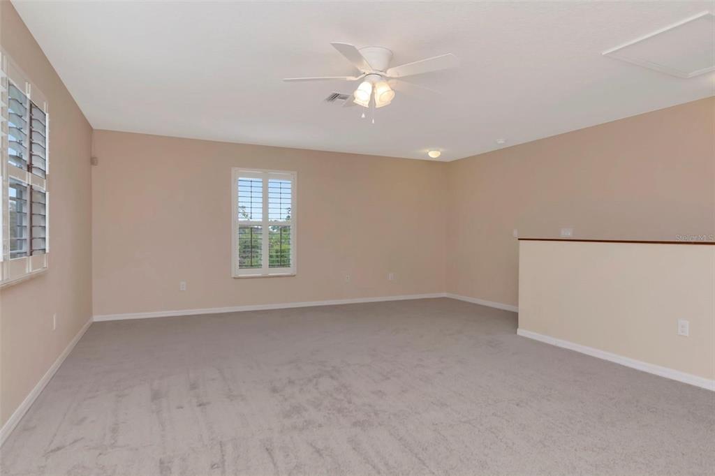1835 Regal Mist Loop Trinity, FL 34655 - Photo 47 of 55 a view of an empty room with a window